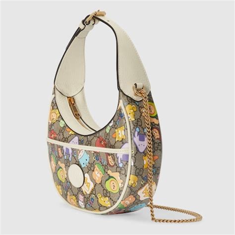 gucci borse animali|Borsa multifunzionale con stampa animali Gucci.